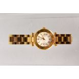 A LADIES' GUESS BRAND NEW WRISTWATCH in original box.