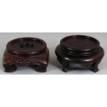 TWO SMALL GOOD QUALITY 19TH CENTURY CHINESE CARVED HARDWOOD VASE STANDS, one of square section