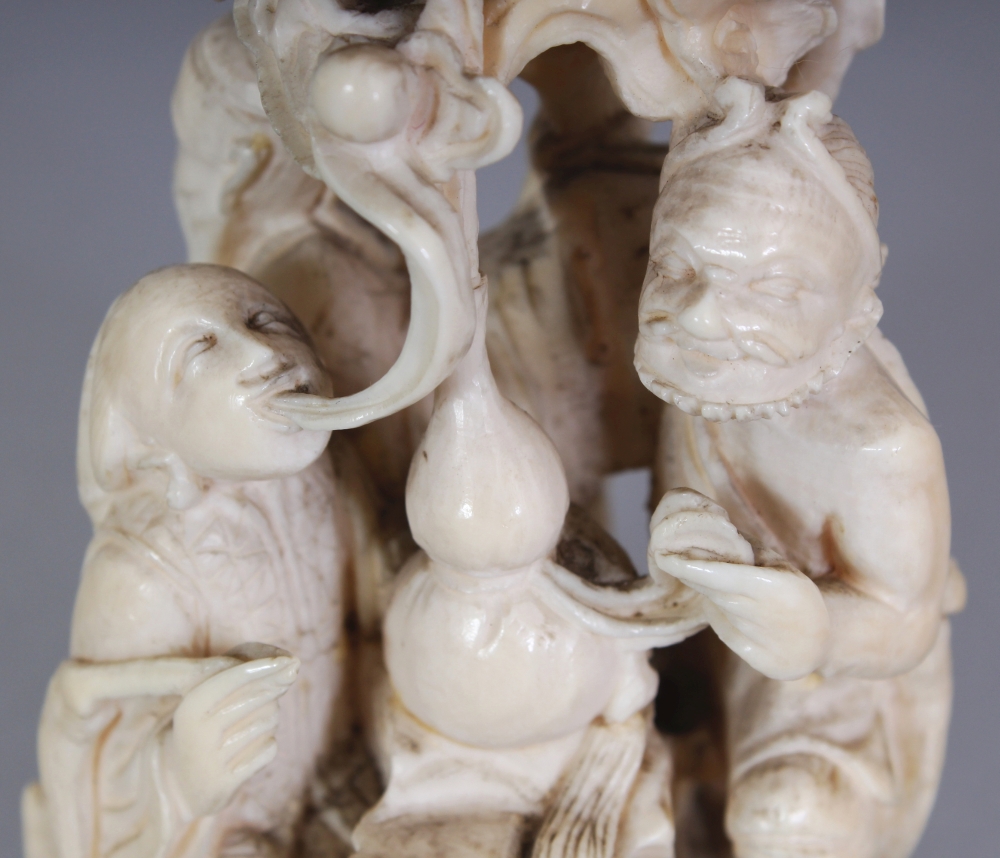 A JAPANESE MEIJI PERIOD IVORY OKIMONO OF A GROUP OF THREE IMMORTALS & A BOY ATTENDANT IN A PINE - Image 5 of 9