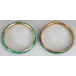 TWO MALACHITE AND GILT METAL BANGLES, the largest 2.8in diameter. (2)