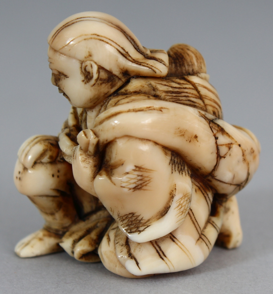 A JAPANESE MEIJI PERIOD IVORY NETSUKE OF EBISU, unsigned, the kneeling deity carrying a monkey - Image 2 of 6