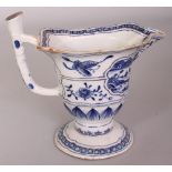 AN 18TH CENTURY CHINESE EXPORT QIANLONG PERIOD BLUE & WHITE PORCELAIN HELMET JUG, painted with