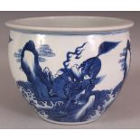 A FINE CHINESE KANGXI PERIOD BLUE & WHITE PORCELAIN JARDINIERE, circa 1700, the sides painted with