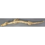 A GOOD JAPANESE MEIJI PERIOD BONE IVORY ARTICULATED MODEL OF A DRAGON, with moveable body, head