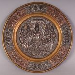 A SMALL 19TH CENTURY INDIAN COPPER & SILVER-METAL ONLAID BRASS DISH, decorated to its centre with