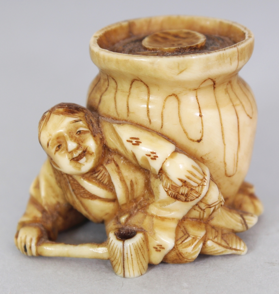 A SMALL JAPANESE MEIJI PERIOD STAINED IVORY OKIMONO, unsigned and possibly intended as a netsuke,