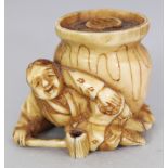 A SMALL JAPANESE MEIJI PERIOD STAINED IVORY OKIMONO, unsigned and possibly intended as a netsuke,