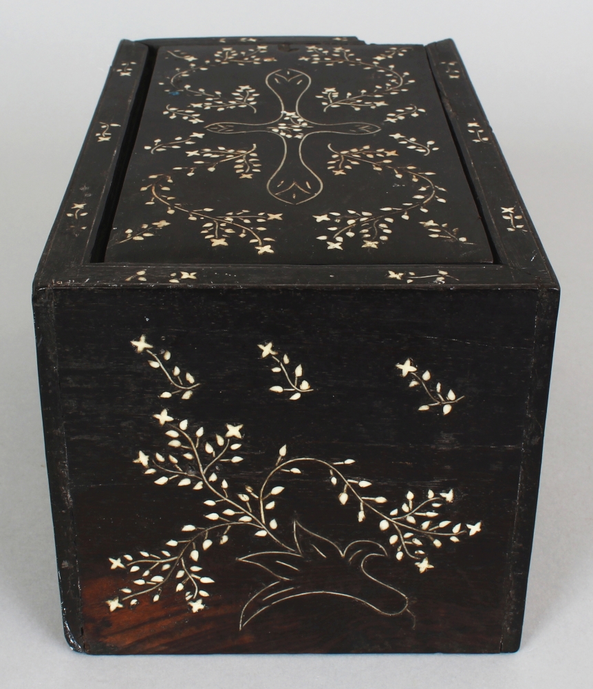 AN EASTERN BONE INLAID HEAVY HARDWOOD RECTANGULAR BOX, with sliding cover, decorated with meandering - Image 3 of 7