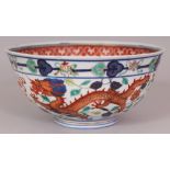 A GOOD QUALITY 19TH CENTURY CHINESE WUCAI DRAGON & PHOENIX BOWL, the sides painted with