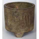 A CHINESE ISLAMIC MARKET CYLINDRICAL BRONZE TRIPOD CENSER, weighing 980gm, the sides cast with