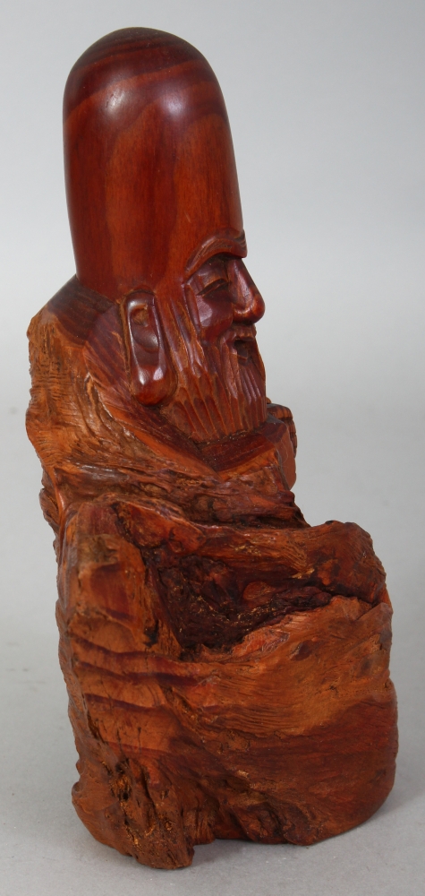 A JAPANESE CARVED ROOTWOOD FIGURE OF FUKUROKUJU, the bearded deity standing beside stylised - Image 2 of 7