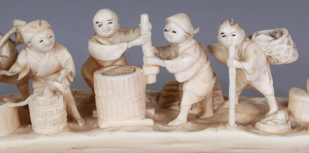 AN UNUSUAL SIGNED JAPANESE MEIJI PERIOD IVORY TUSK CARVING, in the form of a group of villagers at - Image 5 of 10