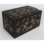 AN EASTERN BONE INLAID HEAVY HARDWOOD RECTANGULAR BOX, with sliding cover, decorated with meandering