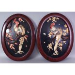 ANOTHER PAIR OF JAPANESE MEIJI PERIOD OVAL ONLAID LACQUERED WOOD PANELS, each in a red-ground