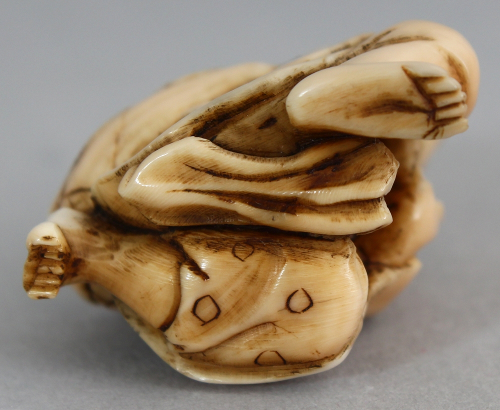 A JAPANESE MEIJI PERIOD IVORY NETSUKE OF EBISU, unsigned, the kneeling deity carrying a monkey - Image 6 of 6