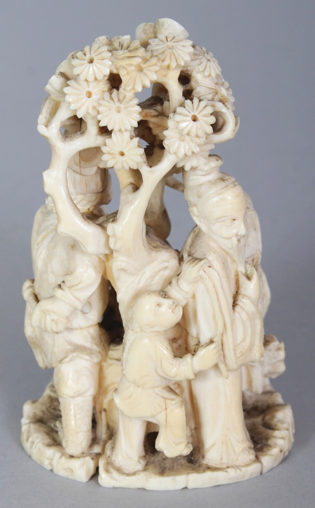 A JAPANESE MEIJI PERIOD IVORY OKIMONO OF A GROUP OF THREE IMMORTALS & A BOY ATTENDANT IN A PINE - Image 3 of 9