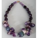 AN AMETHYST AND HARDSTONE NECKLACE, approx. 19in long.