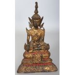 A 19TH CENTURY THAI GILDED & LACQUERED BRONZE FIGURE OF BUDDHA, seated in meditation on a stepped