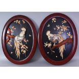 ANOTHER PAIR OF JAPANESE MEIJI PERIOD OVAL ONLAID LACQUERED WOOD PANELS, each in a red-ground