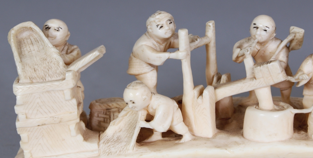 AN UNUSUAL SIGNED JAPANESE MEIJI PERIOD IVORY TUSK CARVING, in the form of a group of villagers at - Image 6 of 10