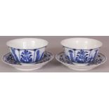 A PAIR OF 19TH CENTURY CHINESE BLUE & WHITE PORCELAIN BOWLS & SAUCERS, each piece painted with