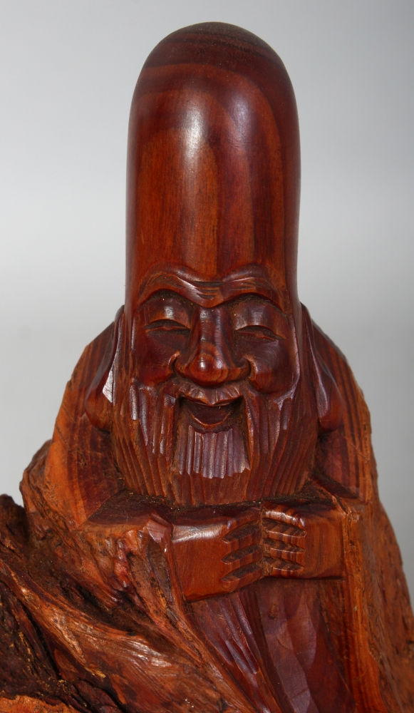 A JAPANESE CARVED ROOTWOOD FIGURE OF FUKUROKUJU, the bearded deity standing beside stylised - Image 5 of 7