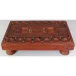 A NORTH AFRICAN BONE & EBONY INLAID LOW RECTANGULAR TABLE, possibly a games table, 15.5in x 9.75in x