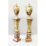 AN IMPRESSIVE PAIR OF RED VARIEGATED MARBLE AND ORMOLU MOUNTED PEDESTALS AND URNS, with extensive