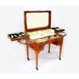 A SUPERB "MAPLES" SATINWOOD DRESSING TABLE WITH SILVER FITMENTS , London 1919, with lift up top