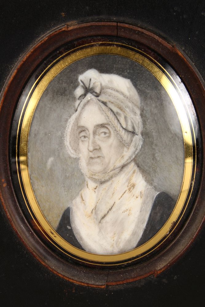 AN EARLY 19TH CENTURY OVAL PORTRAIT MINIATURE OF AN OLD LADY wearing a large bonnet. 8cms x 5.5cms - Image 2 of 3