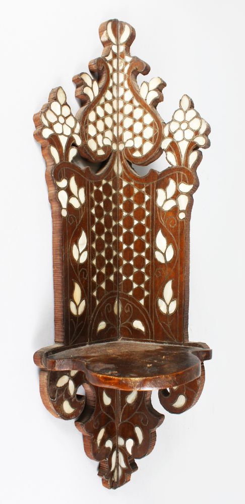 AN OTTOMAN WOODEN AND MOTHER-OF-PEARL TURBAN CORNER STAND. 1ft 10ins long.