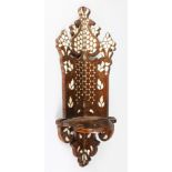 AN OTTOMAN WOODEN AND MOTHER-OF-PEARL TURBAN CORNER STAND. 1ft 10ins long.