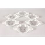 A GOOD SET OF SIX LALIQUE CIRCULAR DISHES with leaf handles. 3.75ins diameter.