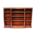 A 19TH CENTURY MAHOGANY BREAKFRONT OPEN BOOKCASE with plain top, open front enclosing adjustable