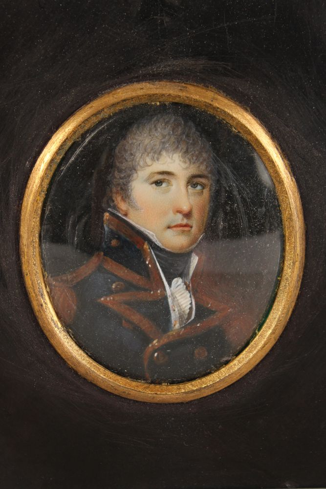 A 19TH CENTURY OVAL PORTRAIT MINIATURE OF A MAN IN MILITARY DRESS. 7cms x 6cms, with gilt surround - Image 2 of 2