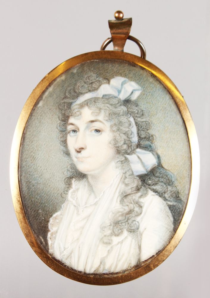 AFTER CHARLES JAGGER AN OVAL PORTRAIT MINIATURE OF A LADY with loose powdered hair, wearing a
