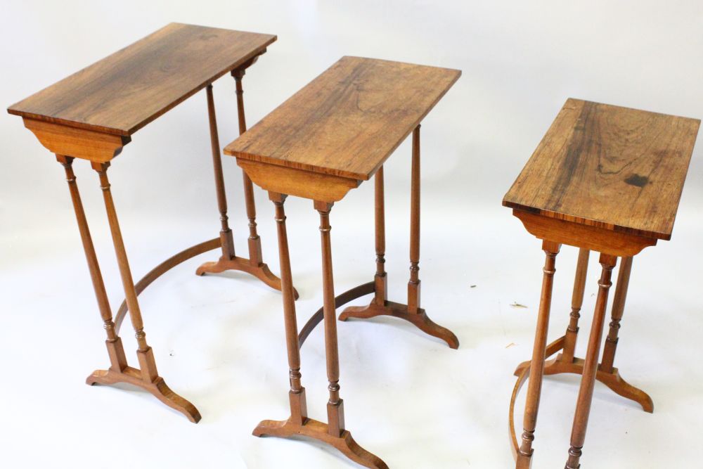 A GOOD NEST OF THREE REGENCY MAHOGANY TABLES with plain rectangular tops and turned supports. - Image 2 of 3