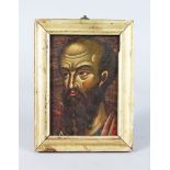 A RUSSIAN ORTHODOX HEAD OF A SAINT, on panel 5ins x 3ins, in a gilt frame.