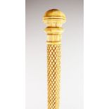 A 19TH CENTURY WHALE BONE STICK. 31ins long.