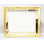 A GEORGE III STYLE GILTWOOD DIVISIONAL MIRROR, with beaded sections, plain hollow mould with