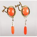 A PAIR OF CORAL AND GOLD EARRINGS.