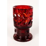 A HEAVY CUT GLASS RUSSIAN GOBLET. 7.5ins high.