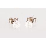 A PAIR OF WHITE GOLD DIAMOND STUD EARRINGS.