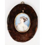 A 19TH CENTURY OVAL PORTRAIT MINIATURE OF A CLASSICAL YOUNG LADY. Signed Ethel W......... 7.5cms x