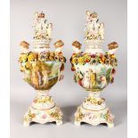A GOOD LARGE PAIR OF DRESDEN STYLE FLOWER ENCRUSTED URNS, COVERS AND STANDS, painted with
