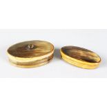 TWO SCOTTISH OVAL SNUFF BOXES, one with a "Cairngorm". 8cms and 7cms long.