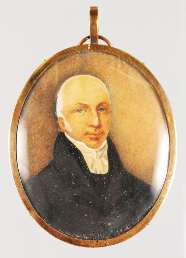 EARLY 19TH CENTURY ENGLISH, CIRCA. 1820 AN OVAL PORTRAIT MINIATURE OF A GENTLEMAN wearing a black