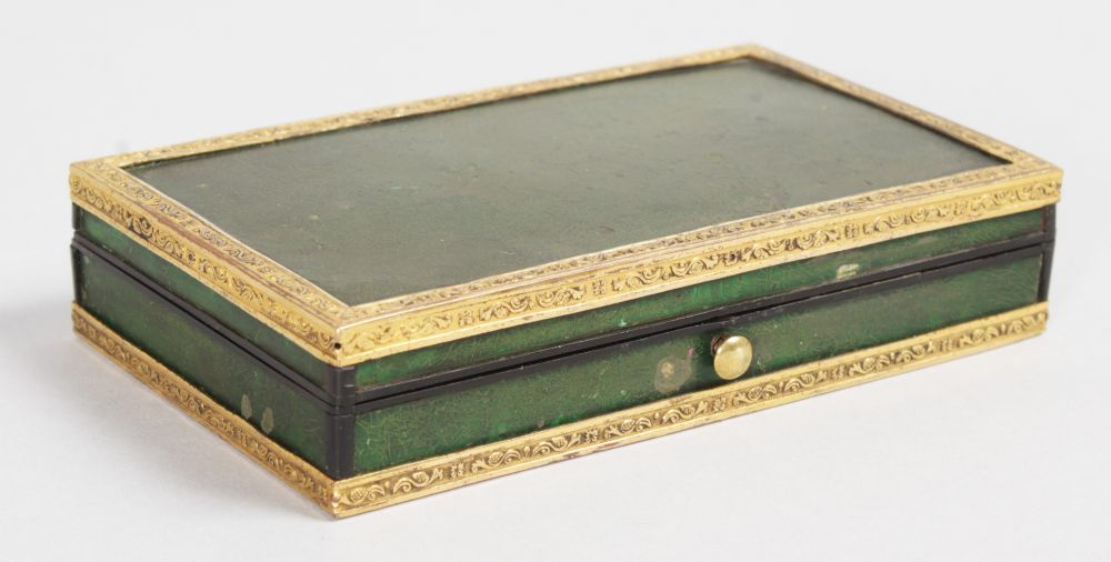 A GOOD REGENCY RECTANGULAR BOX, the lid with an inside mirror, the box with brass banding. 4.5ins