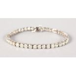 A SUPERB DIAMOND LINE BRACELET, set with forty-three diamonds of just over 8CTS.