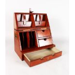 A GOOD LEATHER FOLDING STATIONERY BOX with strap and single drawer. 15ins long.